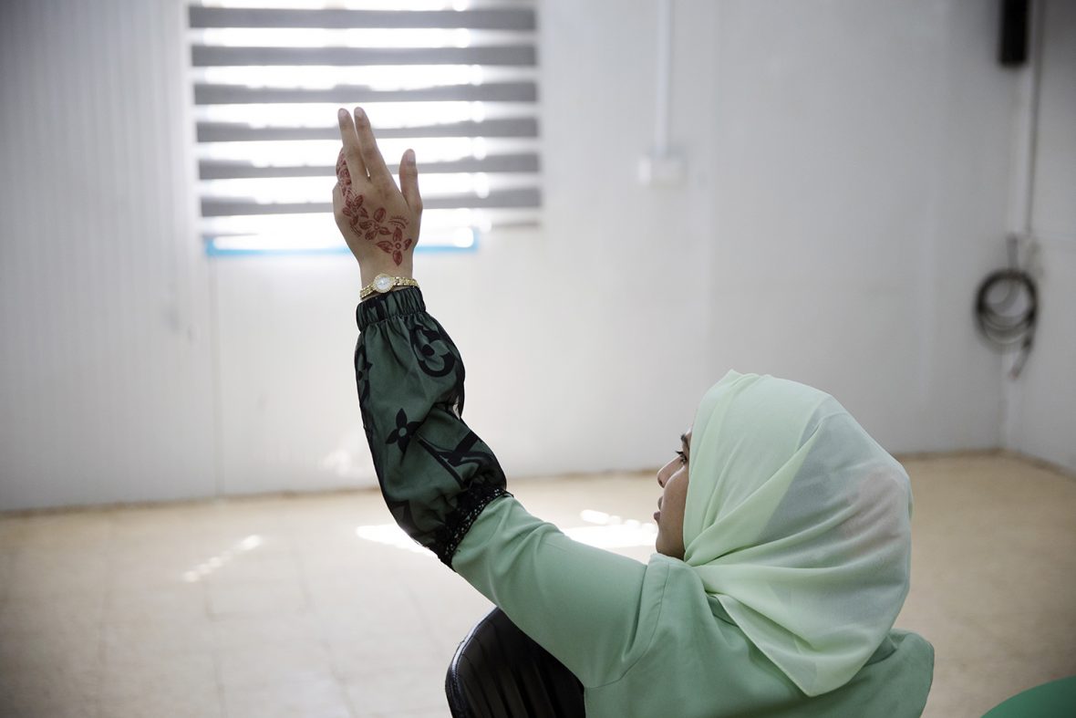 A refugee from Syria in a workshop for adolescent girls in Zaatari refugee camp, Jordan