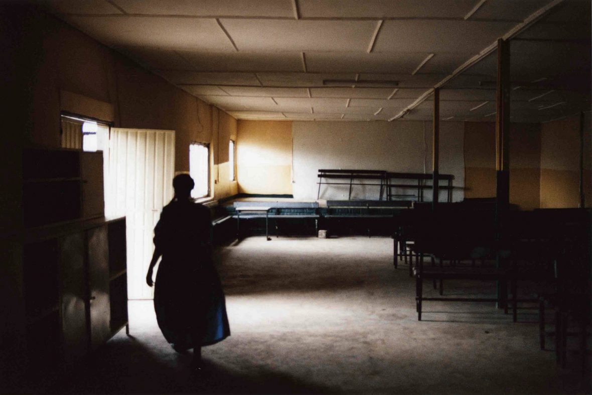 A carer at a day centre for old people in one of Addis Ababa's slums leaves at the end of a day.