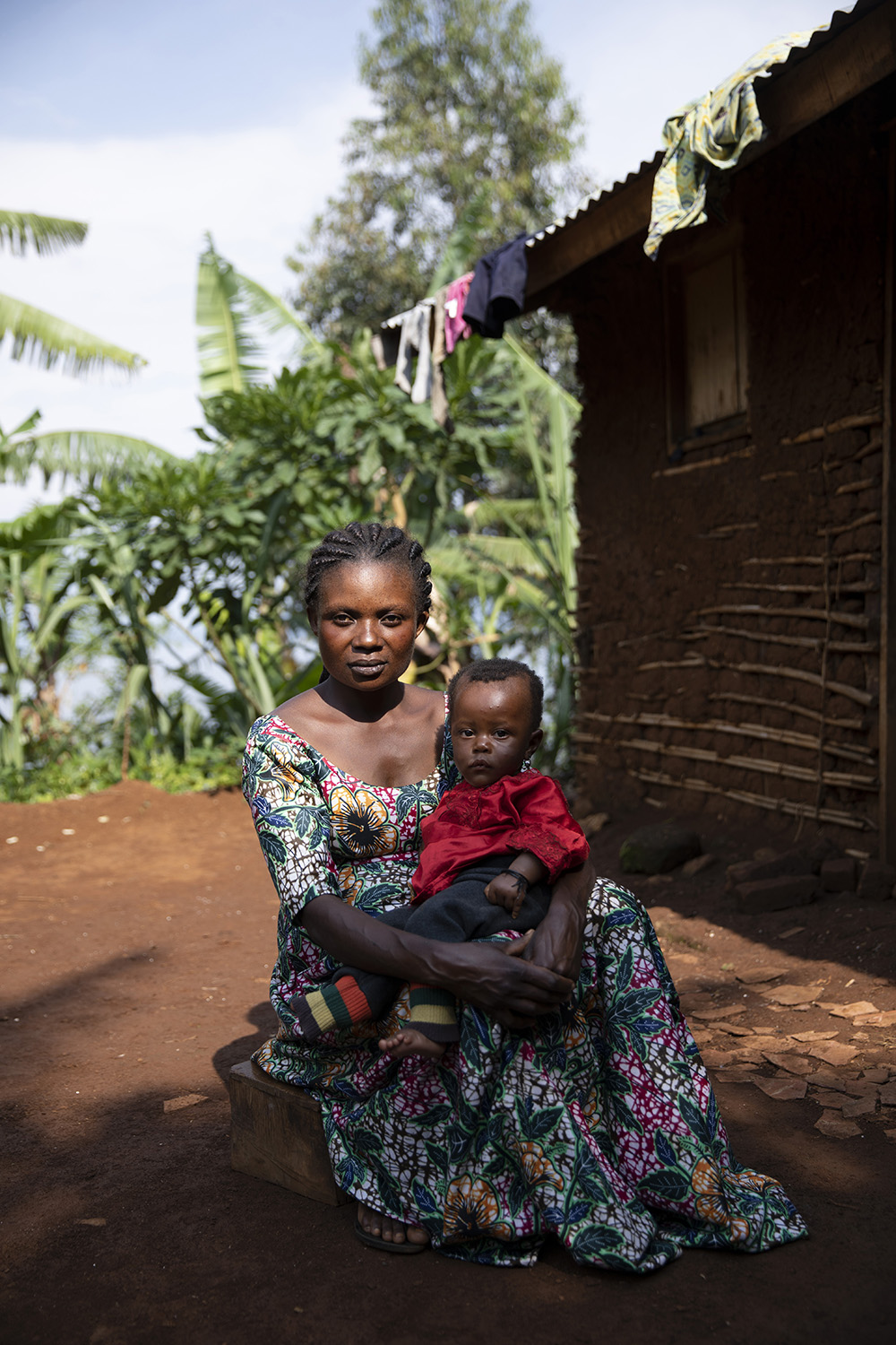 Cadette, 25, had her first child at 11; when we met, she was pregnant with her seventh. Her village in South Kivu, Democratic Republic of Congo, had flooded, so she was now living in a temporary settlement, squeezed into a two room house with her six children, her grandmother and her seven siblings who, as the eldest, she was also looking after. She had so much energy and an amazing sense of humour. The settlement is supported by UNHCR.