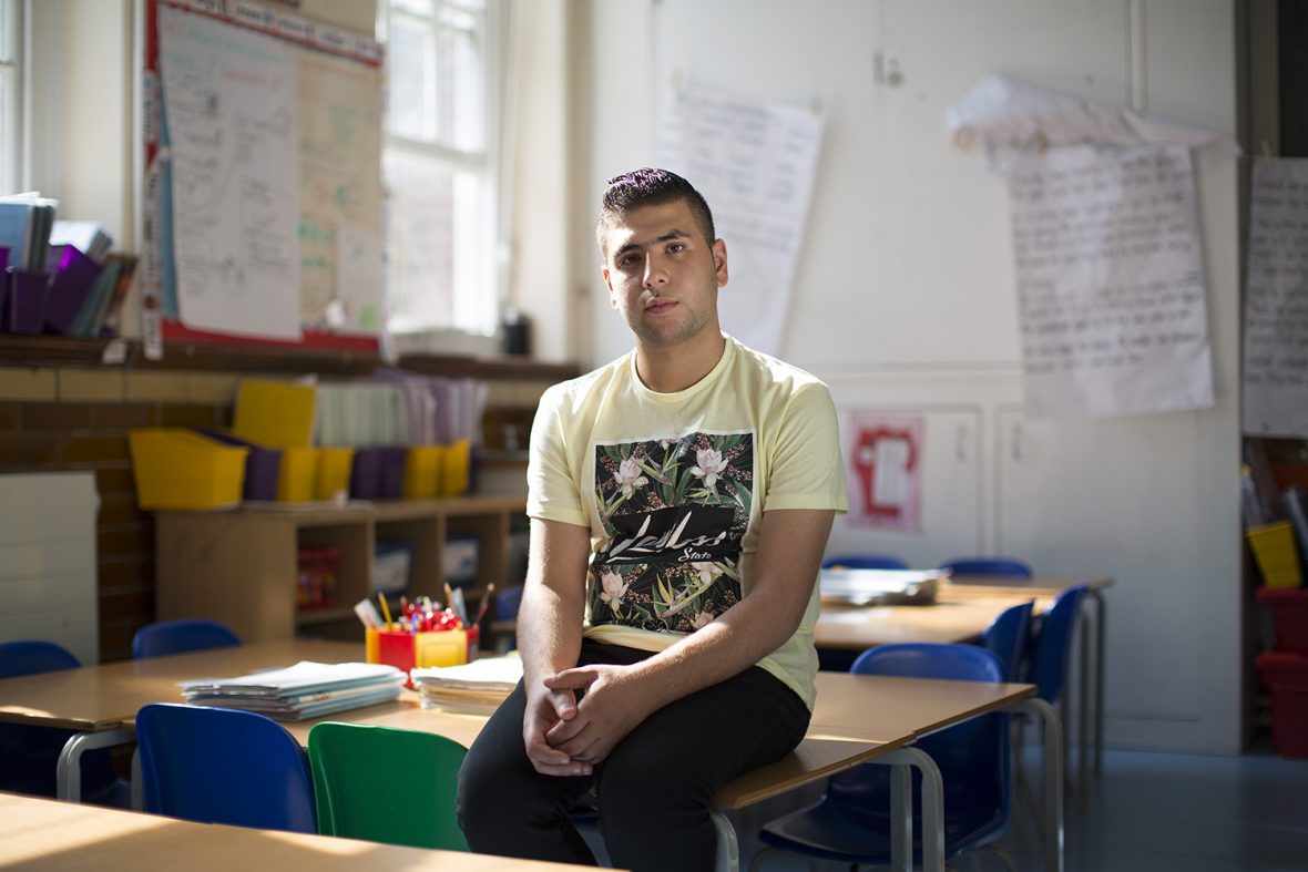 Mustafa Haloum, 21, from Syria. Dream job: teacher. Photographed at Ark Franklin Primary Academy, London.
‘When we arrived, I slept and slept, then after two days, I started to learn English at home. I had brought English books with me from Lebanon. I studied on my own, all-day long for three months because I wanted to progress. I wanted to have a job  and make friends.’
